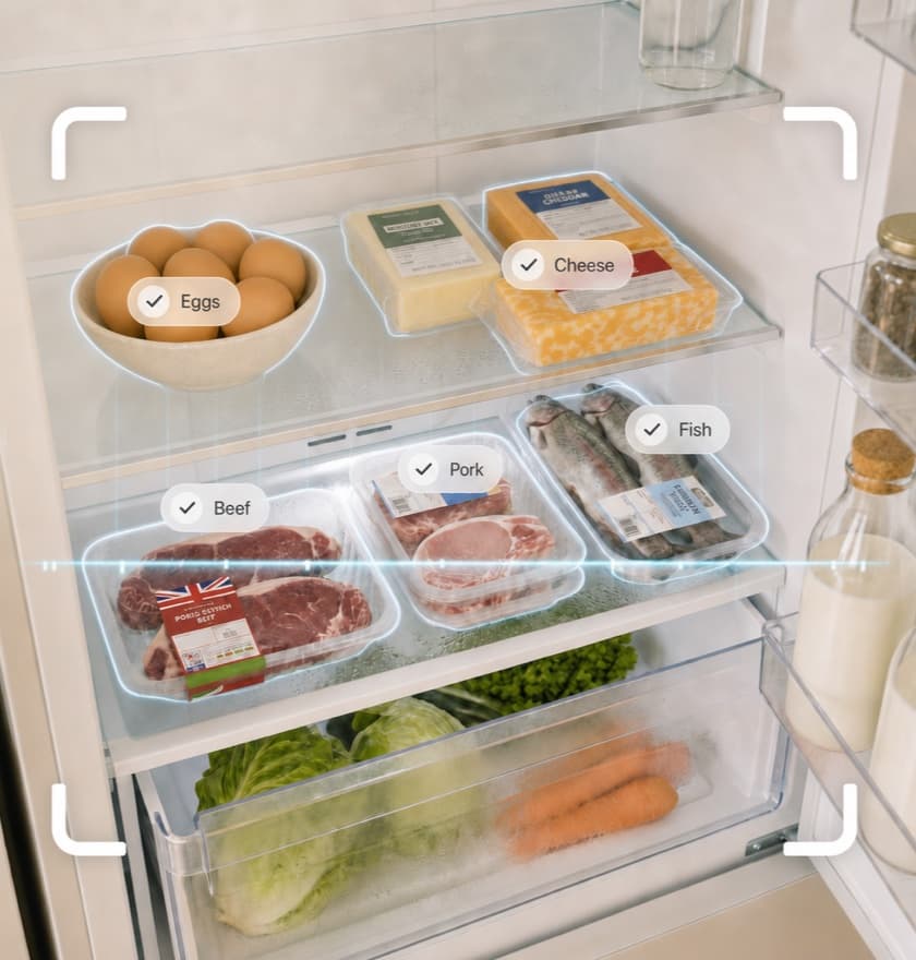 Open fridge photographed by the AI recipe generator — eggs, cheese, fish, pork and beef recognized with labels